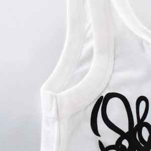 White cotton ribbed tank top for boys featuring minimalist black artistic script print