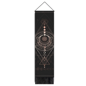 Detail of black tarot tapestry showing rose gold moon phases and mystical symbols