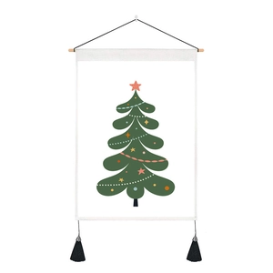 Detail of Christmas tree tapestry with wooden hanging rod and black bottom tassels