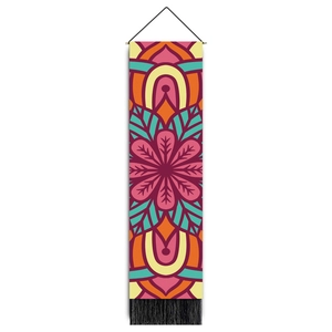 Detail of bohemian mandala tapestry with wooden hanging rod and black fringe tassels