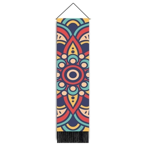 Close-up of mandala tapestry detail with colorful geometric patterns and black tassels