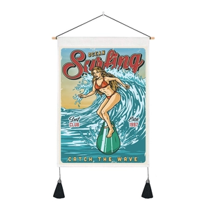 Close-up of retro surfing tapestry featuring vintage canvas texture and tassel details