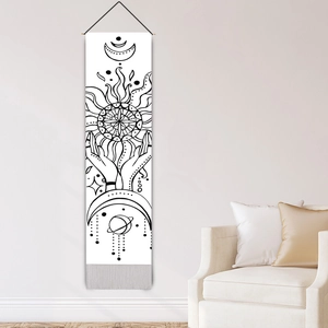Vertical wall tapestry with moon phases and hand graphics on white canvas with tassels