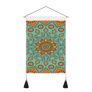 Detailed view of mandala tapestry with wood rod, hanging rope and black twin tassels
