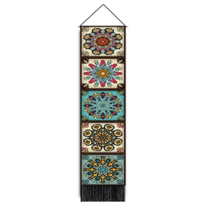 Detailed shot of Nordic mandala wall hanging with intricate geometric patterns and black tassels