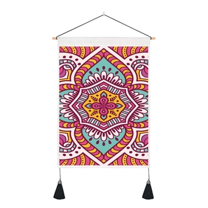 Detailed view of bohemian mandala tapestry with colorful geometric patterns and black tassels