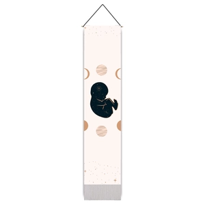 Minimalist starry fetus silhouette wall hanging with moon phases and wooden rod decor
