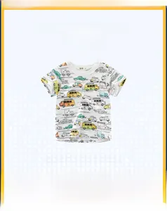 Close-up of white cotton kid's T-shirt featuring colorful all-over cartoon car prints