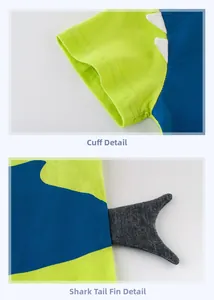 Détail du décor d'aileron de requin et couture de manche sur T-shirt enfant