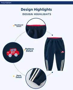 Dettagli dei pantaloni sportivi blu navy da bambino con vita rossa e ricamo