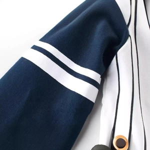 Veste de sport pour garçon avec manches contrastées bleu marine et rayures