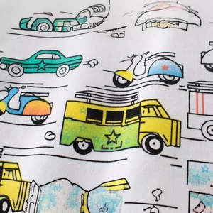 Toddler long sleeve cotton T-shirt featuring colorful cartoon vehicle prints in white