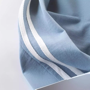Spring boys light blue athletic sweatpants with white side stripes for kids fashion