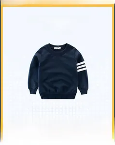 Detail of navy blue kids sweatshirt featuring classic crewneck and white sleeve stripes