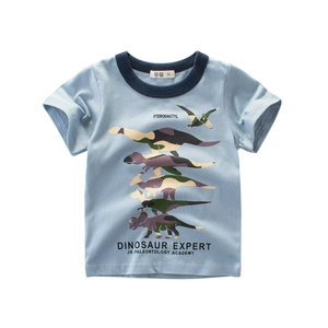 Light blue kids dinosaur t-shirt with contrast navy neckline and camo dinosaur prints