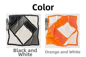 Dettaglio di foulard in seta geometrici con motivi a pois in nero e tonalità arancio