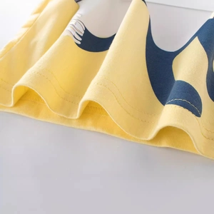 Boys' yellow knit t-shirt featuring animal patterns and durable double-stitched hem