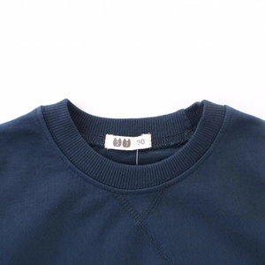Kids navy crewneck sweatshirt with ribbed collar and classic V-stitch detail on white background