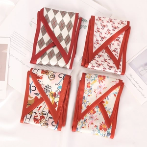 Set of four preppy style faux silk skinny scarves with floral and geometric prints