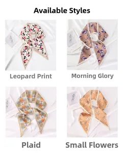 Detail view of four patterned satin skinny scarves including leopard and floral prints