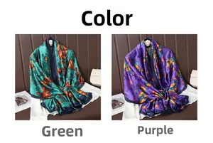 Detail of silk-texture scarves with green and purple traditional floral cloud patterns