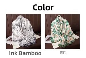 Detail view of silk scarves in Mo Zhu ink bamboo and Qing Zhu green patterns