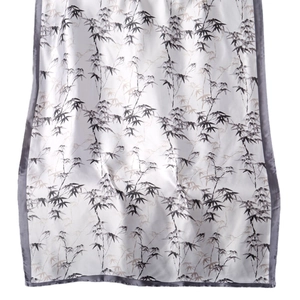 Bamboo print silk scarf for women featuring ink-style patterns and grey satin edges