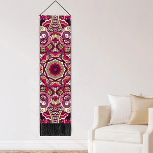 Bohemian mandala tapestry with pink and purple geometric patterns and black tassels