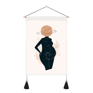 Detail of galaxy tapestry with wooden pole, tassels, and abstract pregnancy art print