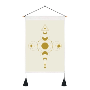 Minimalist boho tapestry with golden sun and moon phases, wood pole and black tassels