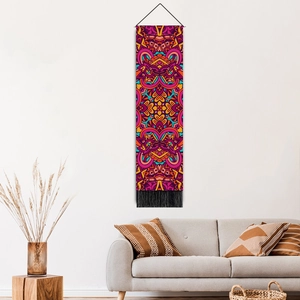 Vertical bohemian mandala tapestry with colorful patterns and black tassels for wall decor
