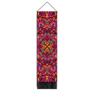 Detail of mandala tapestry with colorful geometric patterns and black tassels fringe