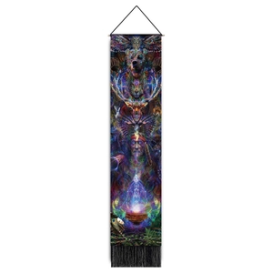 Close-up of wizard animal tapestry with shamanic illustrations and black fringe detail