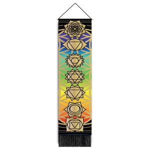 Detailed view of 7 Chakras wall hanging with rainbow gradient and black fringe tassels