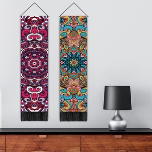 Bohemian mandala wall tapestries with tassels hanging in a modern living room