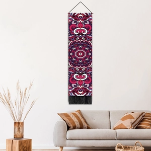 Vertical bohemian mandala tapestry with purple floral patterns and elegant black fringe