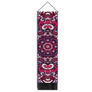 Macro detail of Bohemian Mandala wall hanging with vivid patterns and black tassel fringe