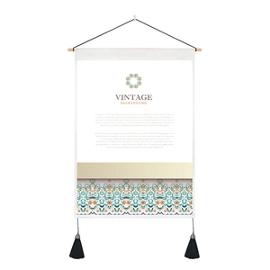Detail of vintage wall tapestry with wood hanger, ethnic geometric patterns and tassels