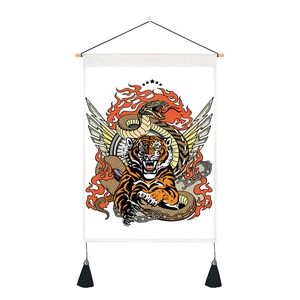 Detail showing an American tattoo style tapestry with tiger, snake, and black tassels
