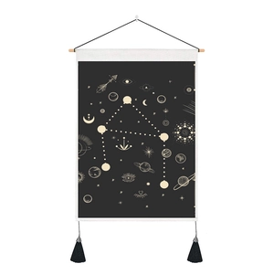Nordic tarot tapestry with astrological motifs and wooden hangers in minimalist style