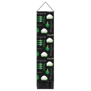 Vertical wall tapestry with green organic vegan vegetable patterns and black fringes