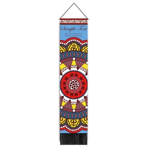 Detail of bohemian mandala wall tapestry with wooden rod and black fringe decoration