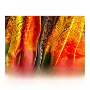Detailed macro view of smooth satin fabric with artistic golden tree branch patterns