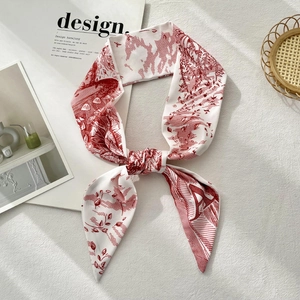 Floral print narrow silk twilly scarf with red botanical design on white fabric
