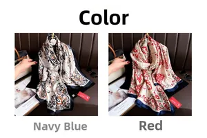 Detail of vintage ethnic silk scarves in navy and red paisley with satin finish