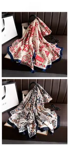 Macro detail of vintage paisley print silk satin long scarves in red and blue tones