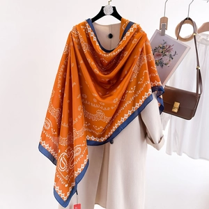 Orange and blue paisley print satin silk shawl wrap for women in a long 180cm size