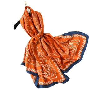 Elegant long silk scarf featuring orange paisley print and blue borders for women