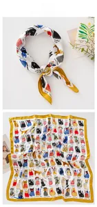 Detailed view of square silk scarf with cute cartoon cat breeds and yellow border