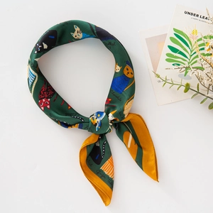 Green silk square scarf featuring cute cat illustrations and yellow rolled edges